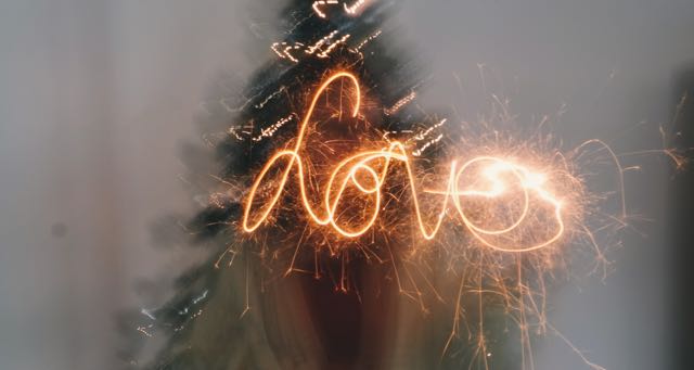 love written in sparkling light