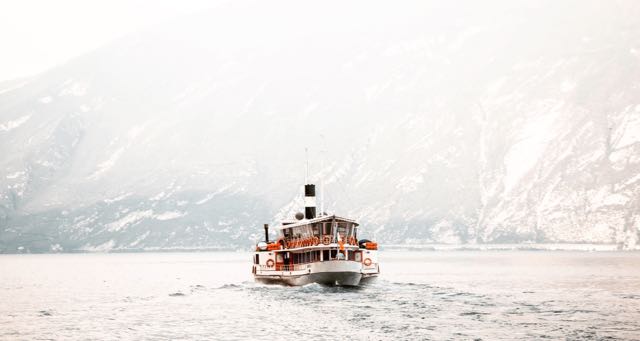 a ferry crossing a fjord