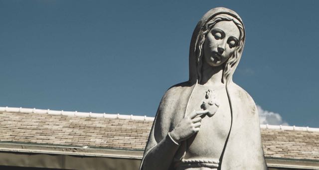 sculpture of the verging merry in a monastery